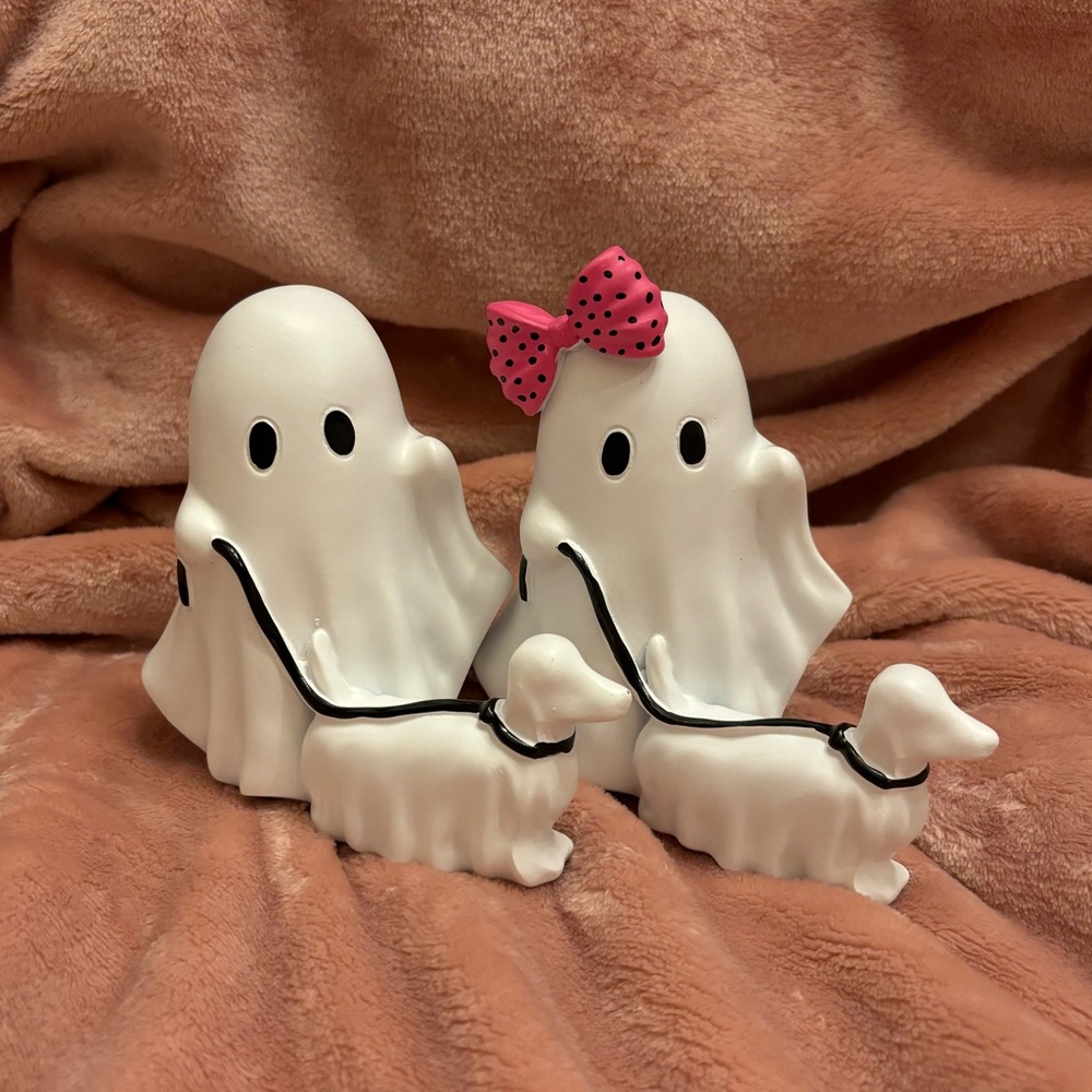 ghosts walking dog statues